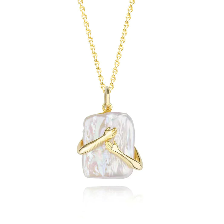 Surrounding square baroque pearl pendant