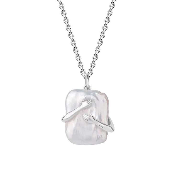 Surrounding square baroque pearl pendant