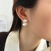 Fan-shaped curved earrings