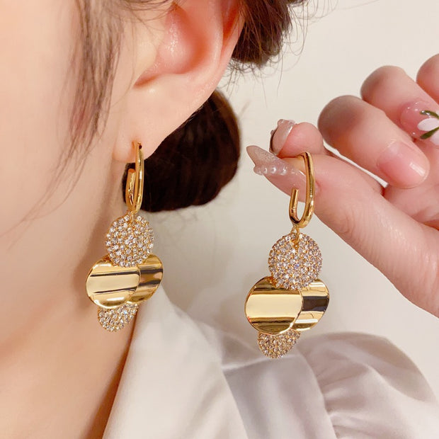 Metal disc tassel earrings