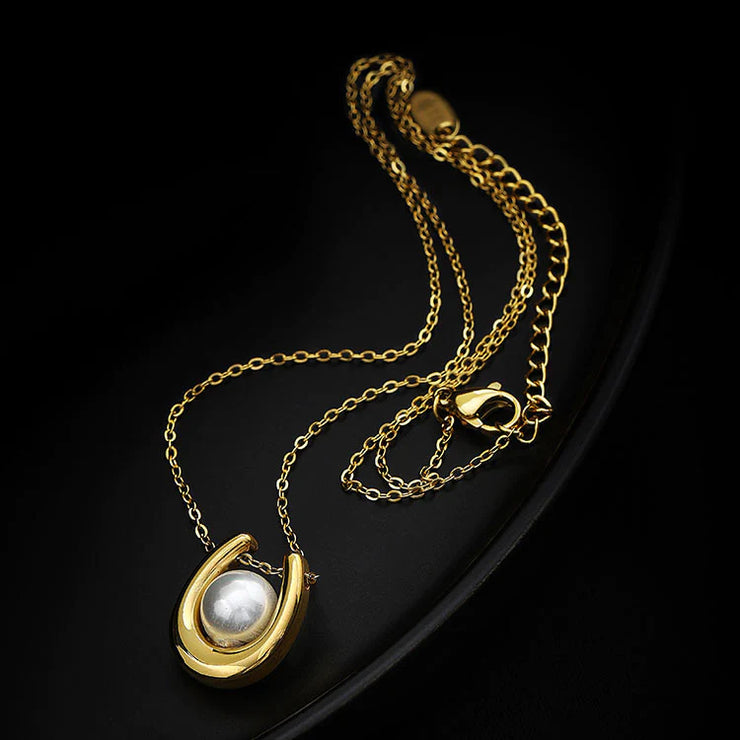 Curved U-shaped pearl necklace