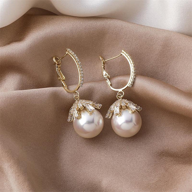 Large pearl earrings