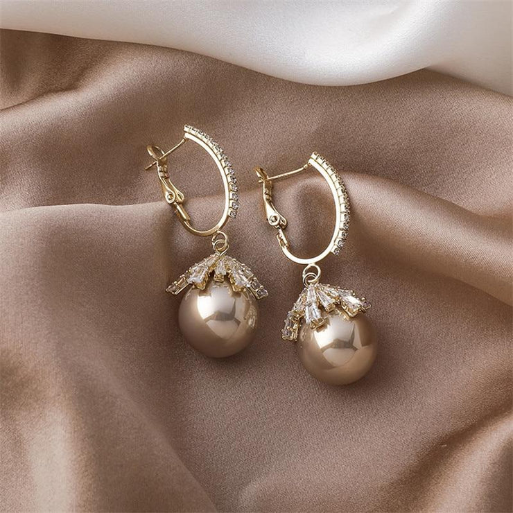 Large pearl earrings