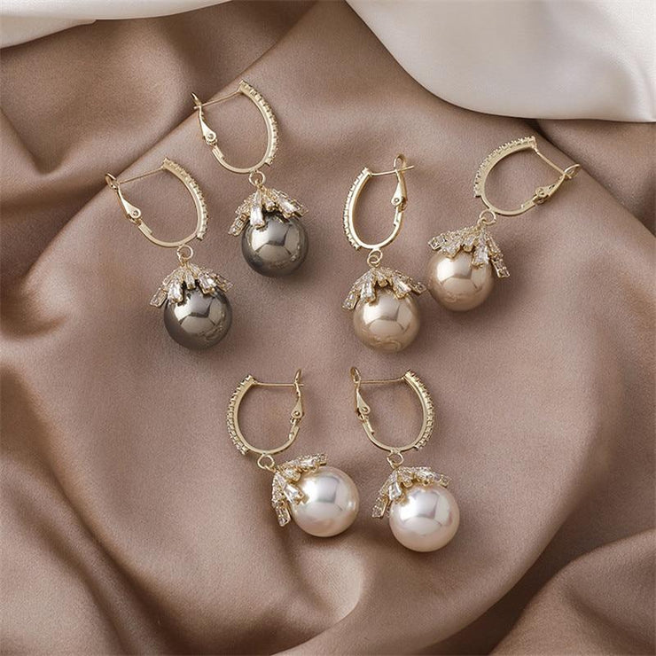 Large pearl earrings