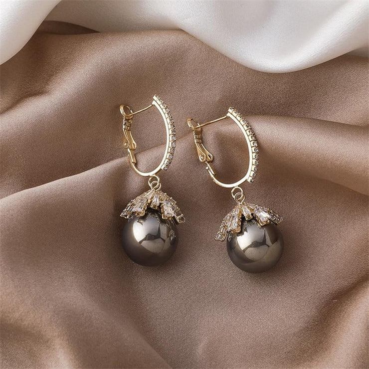 Large pearl earrings