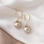 Large pearl earrings